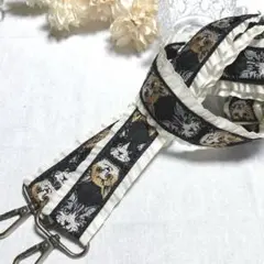 猫柄 フリル付きインド刺繍リボン スマホショルダーストラップ 黒×クリーム