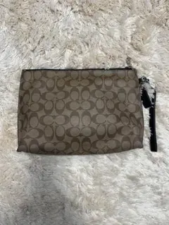 Coach ブラウン ロゴパターン クラッチバッグ