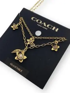 COACH ネックレス ハート スター バタフライ ゴールド - メルカリ