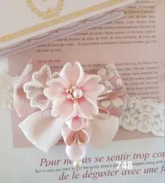 748つまみ細工のベビーヘアバンド　初節句100日祝いハーフバースディ　お宮参り