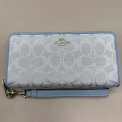 コーチ 新品未使用 花柄カットワーク 長財布 CA065 - メルカリ