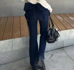 continuer de NICE CLAUP バックリボンデニムフレアパンツのサムネイル