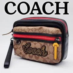 極美品 COACH コーチ ポーチ クラッチバッグ シグネチャー F73254