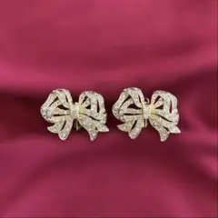 リボン ゴールド イヤリング｜スワロフスキークリスタル 大人かわいい 上品