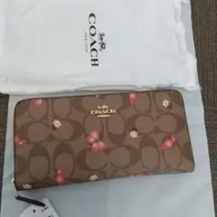 新品　COACH 蝶と花柄 長財布　　２３８ドルタグ付き