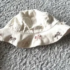 tocca リボン付きクリーム色ベビー帽子 48