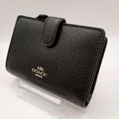 【新品未使用】COACH コーチ 二つ折り財布 ブラック レザー 黒 コンパクトのサムネイル
