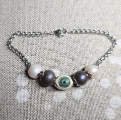 シルバーブレスレット カスタムビーズ お守りチャーム 目のビーズが個性的☆