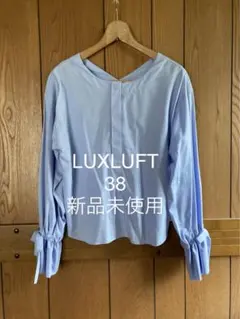 【未使用】新丸ビルLUXLUFT★ふんわりリボン袖が可愛いブルーシャツのサムネイル