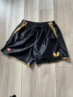 Butterfly エリスター10 卓球　ショートパンツ ブラック/ゴールド