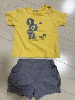 イエローTシャツとグレーショートパンツセット