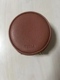 FURLA ピンクベージュ円形ポーチ