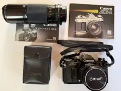 Canon AE-1 ブラック ストロボ付 レンズ2本難ありセットのサムネイル