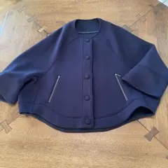 ネイビー ノーカラージャケット フレア袖