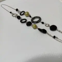 ハンドメイド、黒、シルバー金具の ロングネックレス