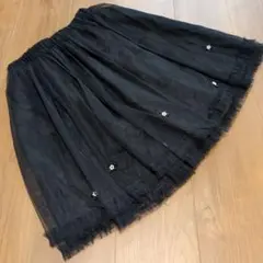 アクシーズファム　黒いフレアスカート 花の刺繍付き