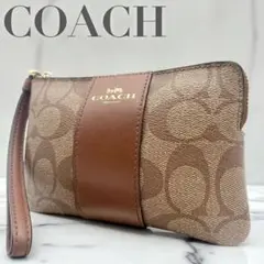 COACH コーチ シグネチャー柄 ポーチ F58035 ブラウン