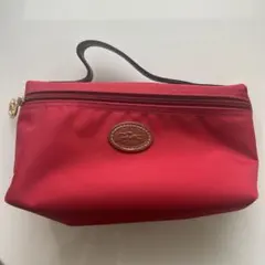赤いポーチ ゴールドジッパー付きのサムネイル