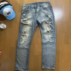 ダメージ加工ブルーデニムパンツ