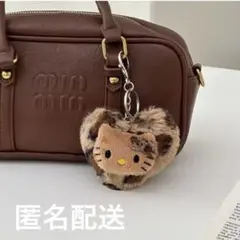 日焼けキティ ヒョウ柄ハートキーホルダー