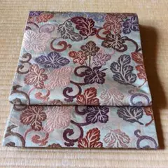 ✳中古品「袋帯」落ち着いた緑に亀甲模様の地・さまざまな色糸で葉模様の刺繍の意匠✳