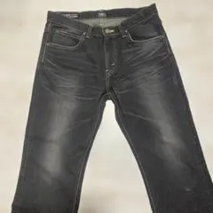 Leeブラックストレッチ加工デニムサイズ表記w32チェーンステッチ