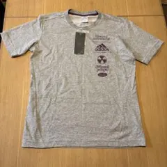 新品タグ付きadidas アディダス Tシャツ グレー Mサイズのサムネイル
