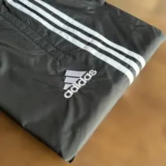 【新品】adidasウインドウパンツ　メンズOサイズ　黒