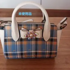 リボンの装飾が可愛いチェック柄ショルダーバッグ