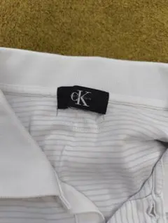 Calvin Klein ホワイト ストライプ ポロシャツ