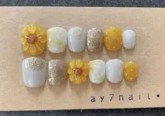 ひまわりぷっくりフラワーネイル　向日葵ネイル　ガーリー　夏ネイル　ベリーショート