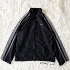 訳あり NIKE ナイロンジャケット サイドライン ロゴ刺繍、メンズM ブラック