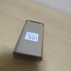 au KYF38 ゴールド折りたたみ携帯電話