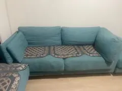 青いファブリックのL字型ソファセット