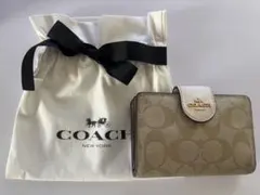 COACH ロゴ入り二つ折り財布 ベージュ