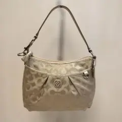Coach ベージュ ロゴ入り ハンドバッグ