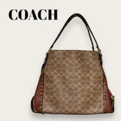 お出かけに　COACH　コーチ　ショルダーバッグ イーディー シグネチャー 茶