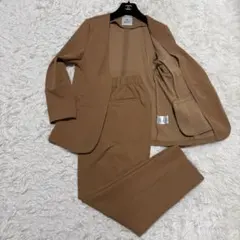 美品【洗える・ストレッチ】　ナノユニバース　セットアップ　パンツスーツ　キャメルのサムネイル