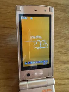 docomo F-02B フォリフォリ コラボ ・携帯電話 本体 充電スタンド付のサムネイル