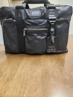 TUMI デラックス・ラップトップ・ブリーフ - メルカリ
