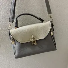 タマミワタナベ バンブー ターンロック レザー リュック グレー 