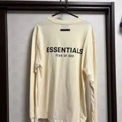 ESSENTIALS バックプリントロンT ベージュ（クリーム）