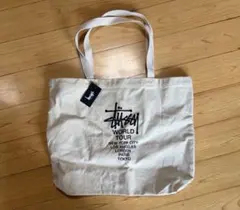 Stüssy ワールドツアー トートバッグ ベージュ　新品未使用のサムネイル