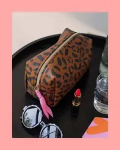 ♦♣♥♠新品未使用！キャロライン・ガードナーレオパードポーチ