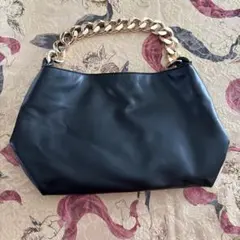 黒の合成皮革ショルダーバッグのサムネイル