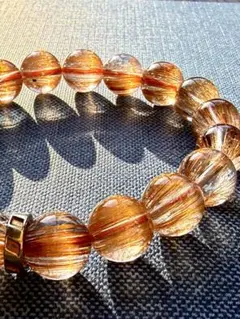 キャッツアイ オレンジルチル ブレスレット 11.5mm パワーストーン