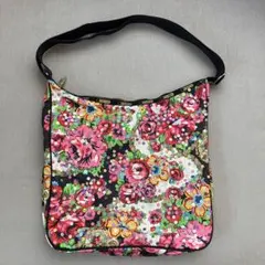 新品✨LeSportsac MANOUSH ハンドバッグ チャーム付 黒 がま口 - メルカリ