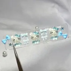 ネイルパーツ　ハローキティ　サンリオ　水色　10個＋おまけセット　デコ　アートDのサムネイル