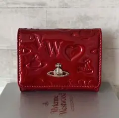 大人可愛いエナメル　赤　Vivienne Westwood 三つ折りウォレット」