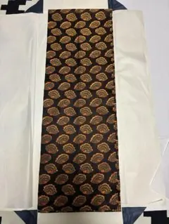 龍村織物　たつむら　開き名古屋帯　彩貝文様　黒地　金糸のサムネイル